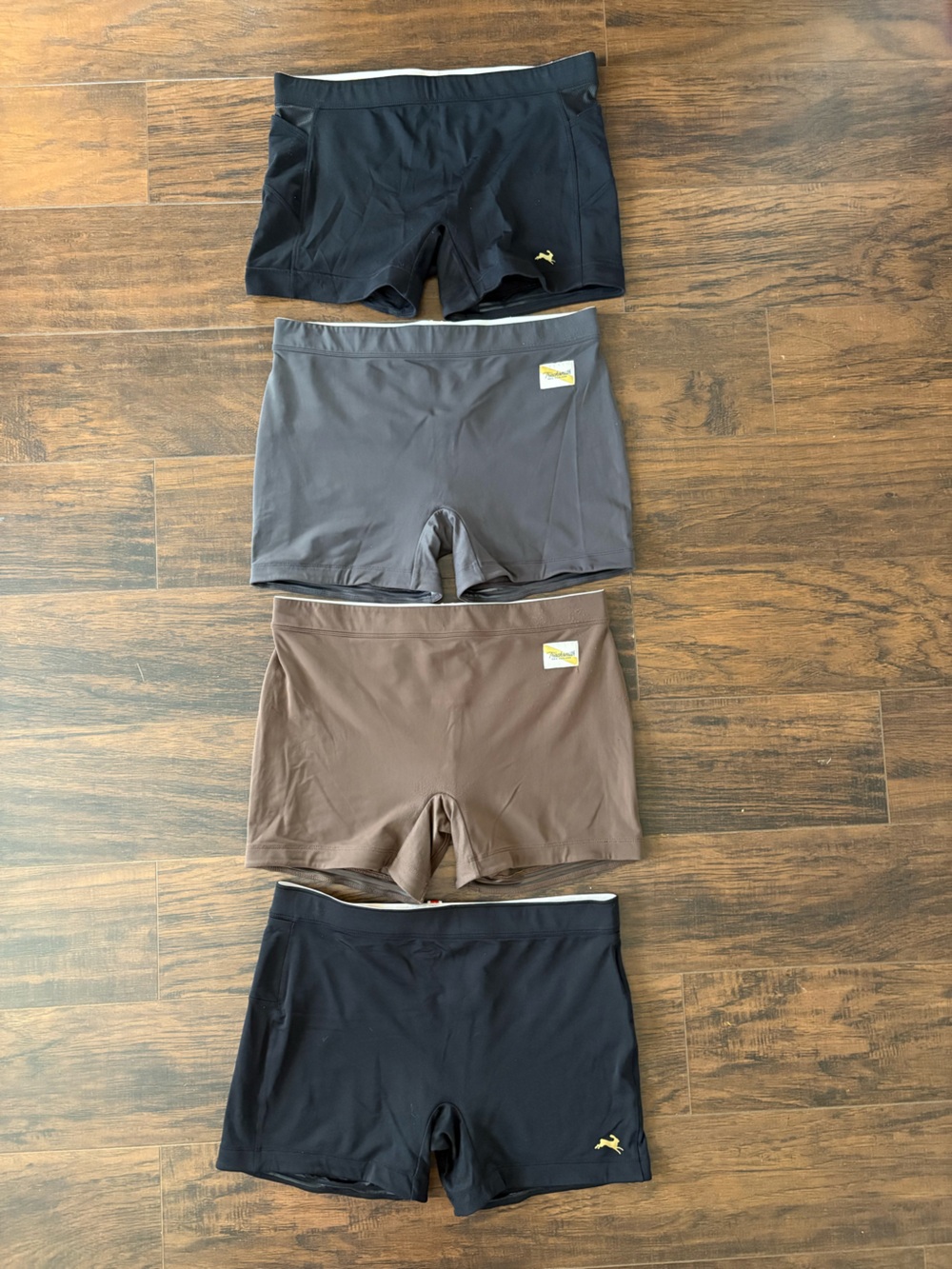 4 pairs of Tracksmith compression shorts size L